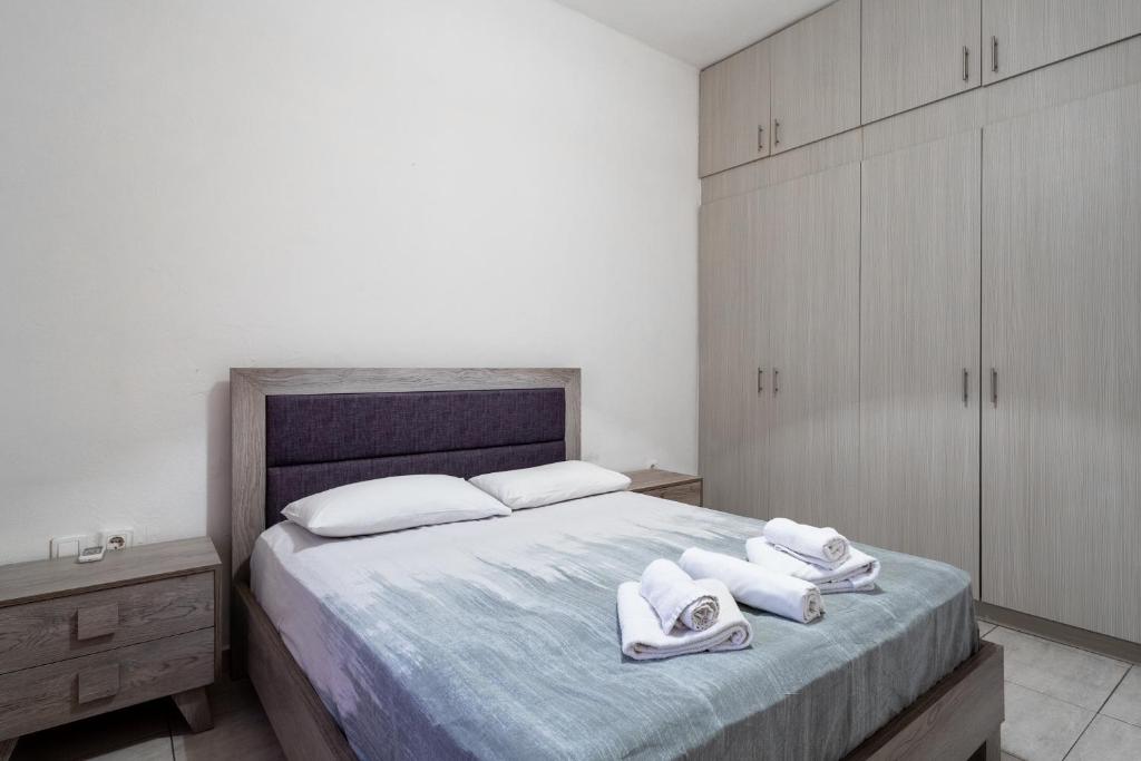 Łóżko lub łóżka w pokoju w obiekcie King home Larissa city