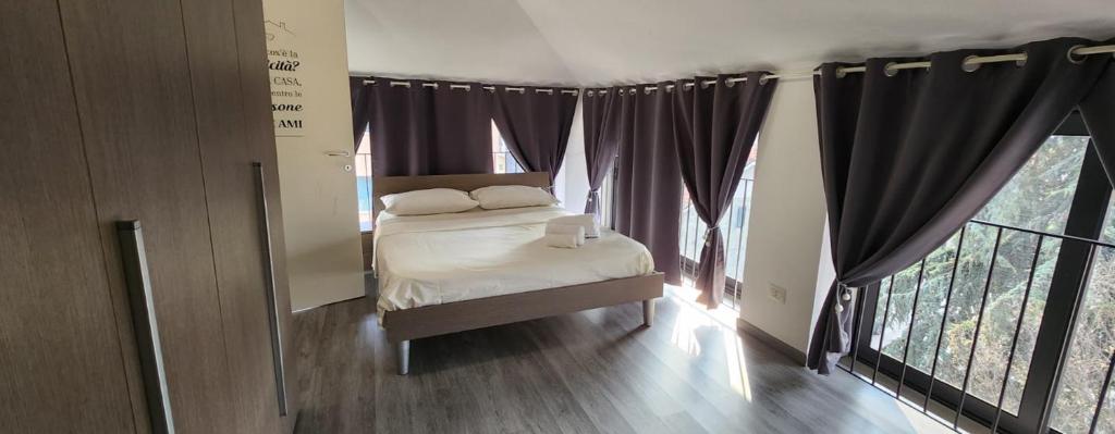 Ένα ή περισσότερα κρεβάτια σε δωμάτιο στο Design Loft Monteponi