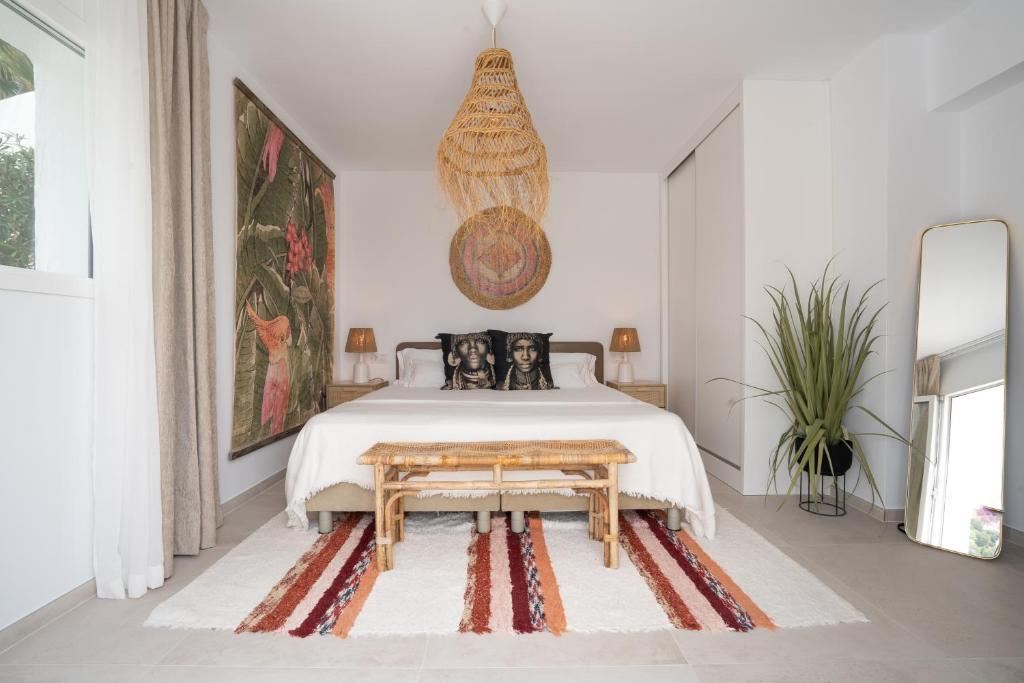Postel nebo postele na pokoji v ubytování Caballito de Mar Boutique Hotel
