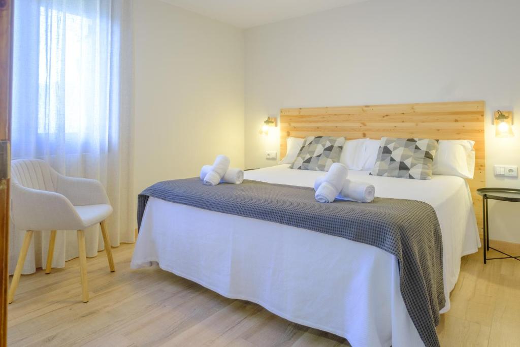 Postel nebo postele na pokoji v ubytování La Era de Casaus