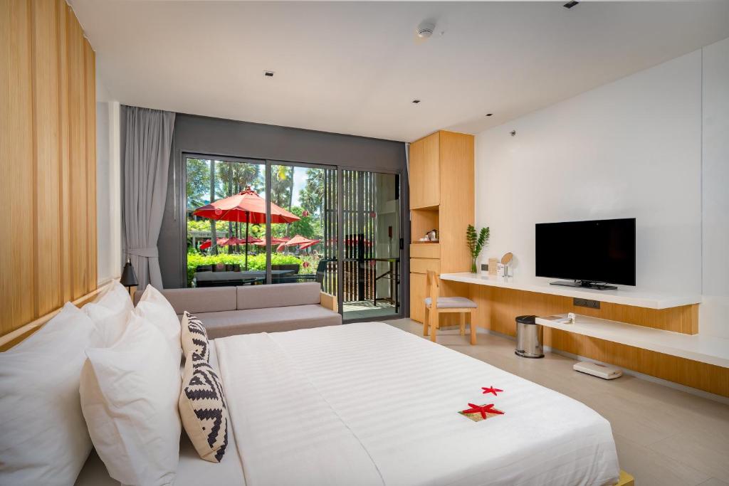 Ramada Resort by Wyndham Khao Lak - Deluxe Lanai-Zimmer Mit Kingsize-Bett