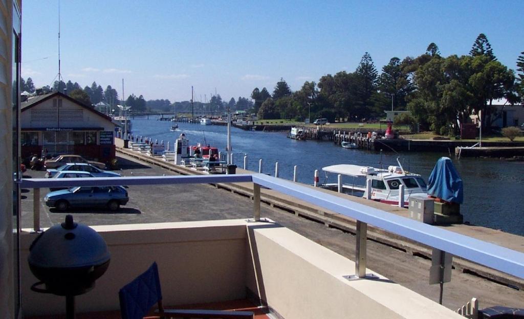 a view of a marina with boats in the water at Dockside Waterfront Indulgence in Port Fairy