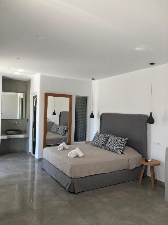 Postel nebo postele na pokoji v ubytování Abelos Mykonos