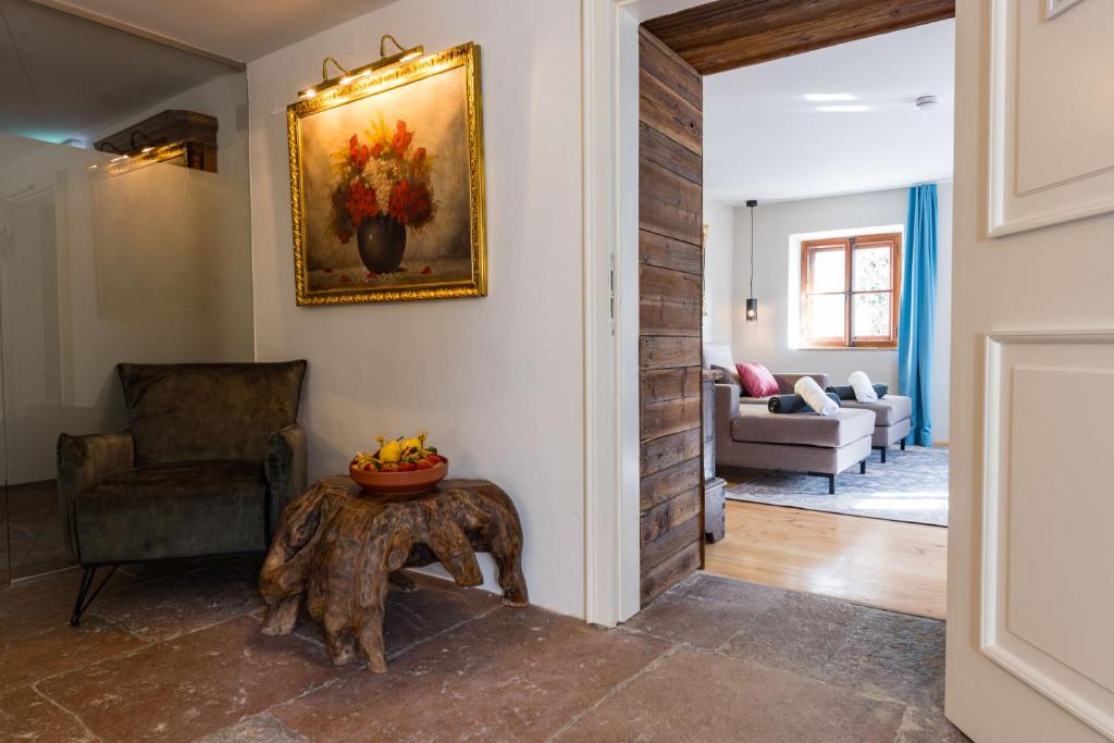 Posezení v ubytování Der Schlosswirt zu Anif - Biedermeierhotel und Restaurant