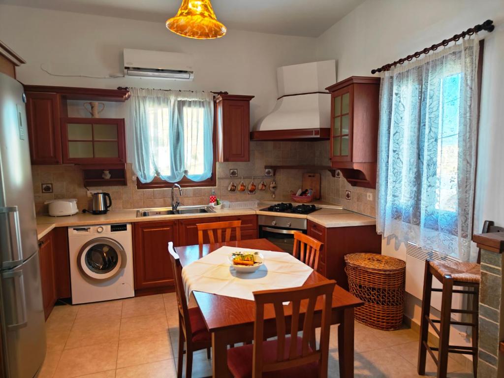 Kuchnia lub aneks kuchenny w obiekcie Nikelen Lindian Exclusive Apartments