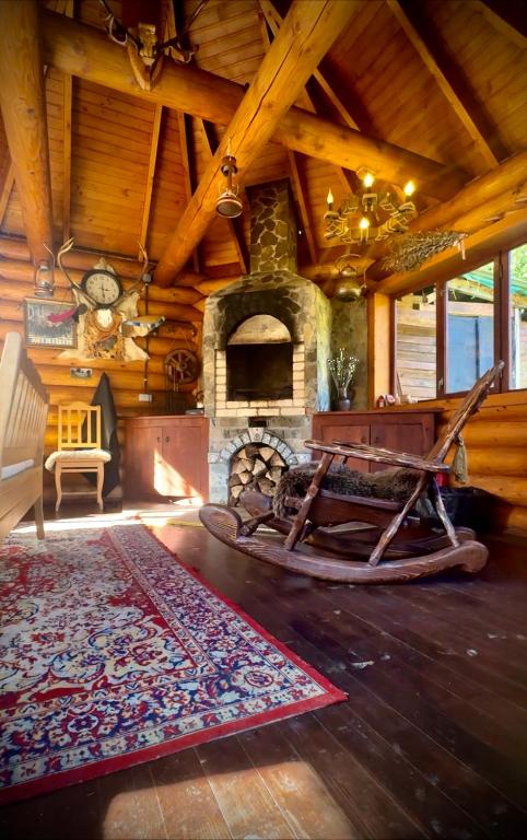 Posezení v ubytování Cottage PolyaNitsa окремий котедж з каміном