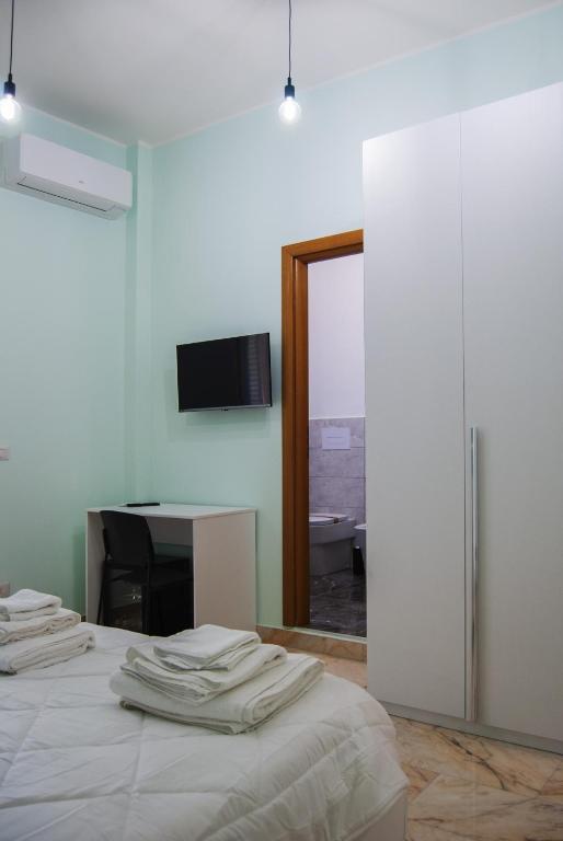 Postel nebo postele na pokoji v ubytování Le Sere
