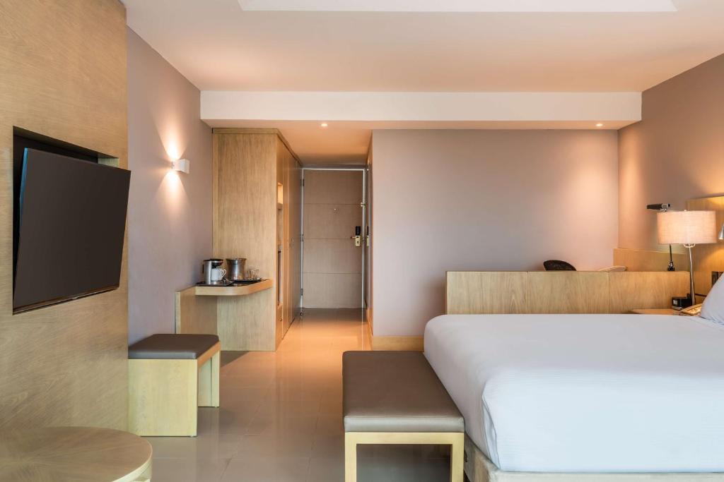 Postel nebo postele na pokoji v ubytování Hilton Cartagena