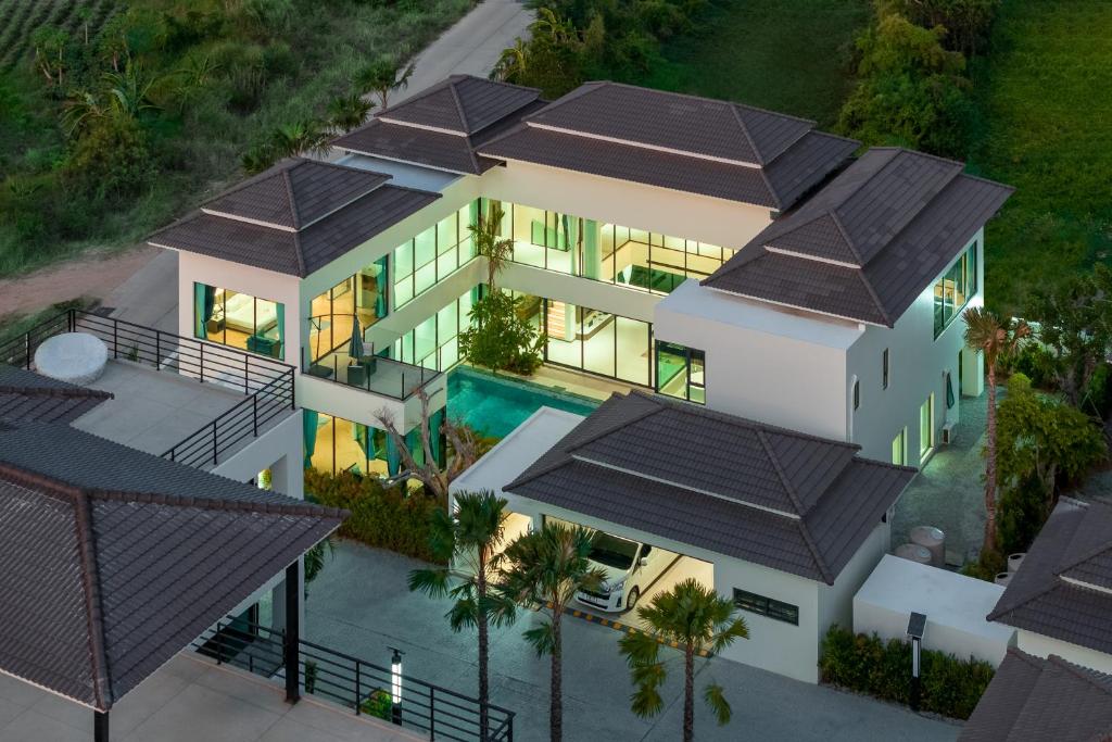 an aerial view of a house with a swimming pool at Sun Diego Resort Pool Villa in Jomtien Beach