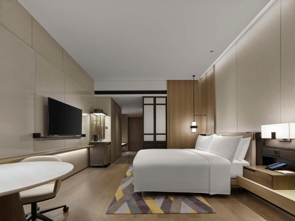 TV a/nebo společenská místnost v ubytování Hilton Zhuhai