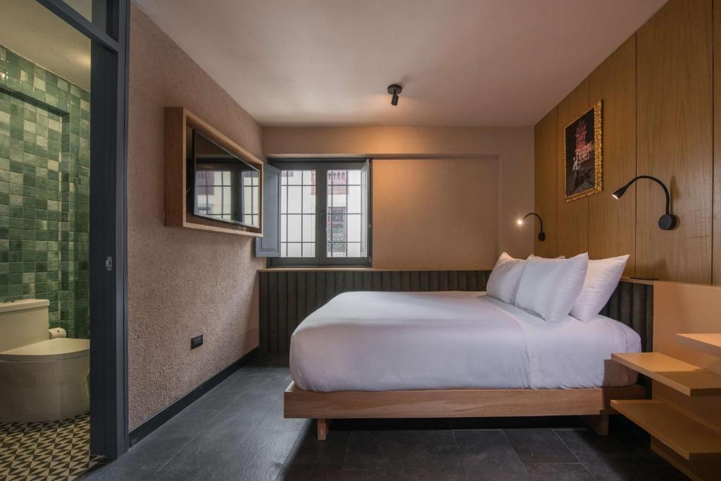 Lova arba lovos apgyvendinimo įstaigoje Motto By Hilton Cusco