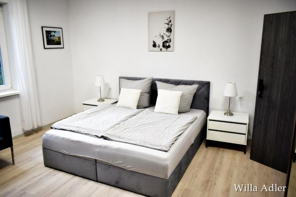 Postel nebo postele na pokoji v ubytování Willa Adler Ustroń - Spokojna okolica, Blisko cntrum