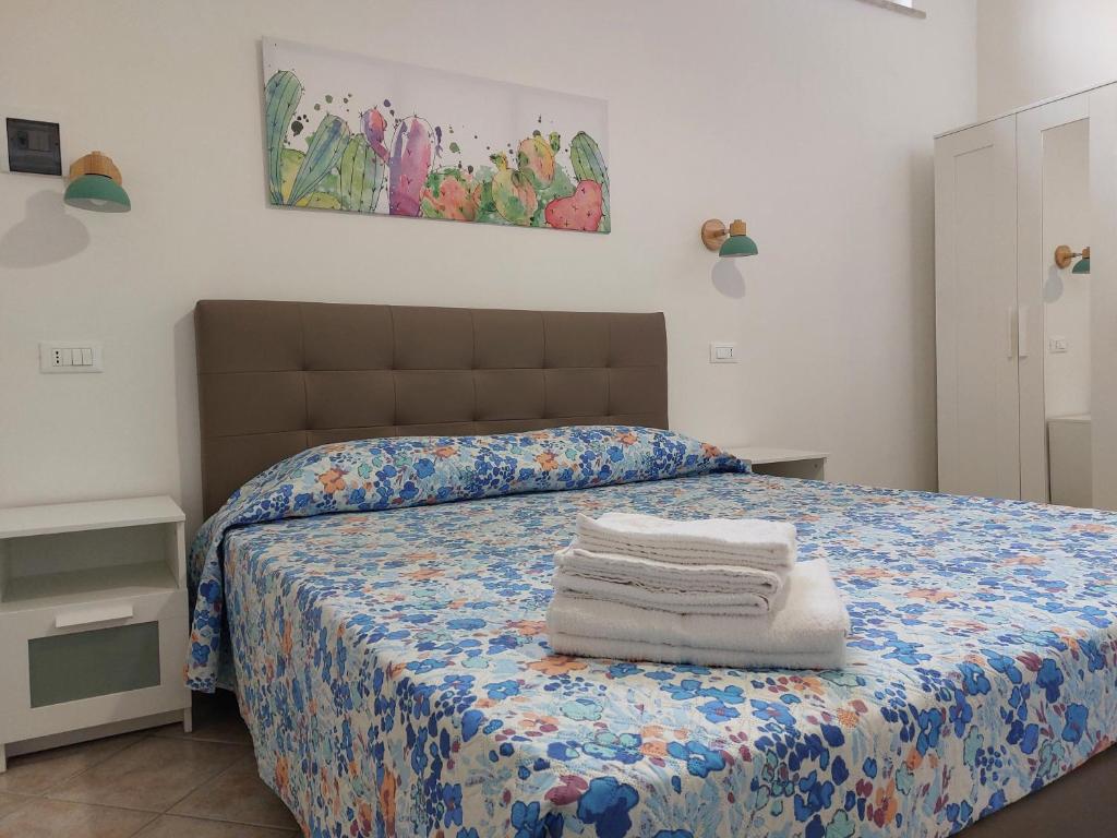 Postel nebo postele na pokoji v ubytování B&B La Filanda