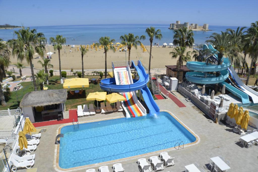 an aerial view of a water slide at a resort at ADMİRAL HOTEL in Kizkalesi