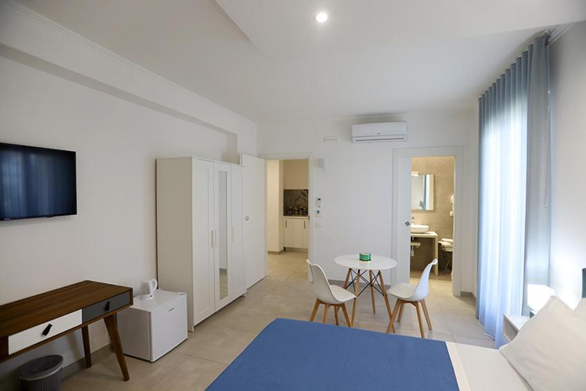 Kuchyň nebo kuchyňský kout v ubytování Dorant Charme&Rooms