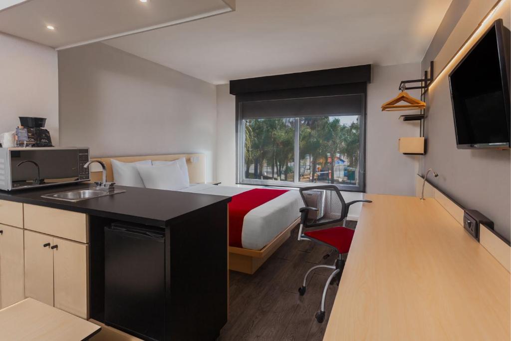 Kuchyň nebo kuchyňský kout v ubytování City Express by Marriott Leon