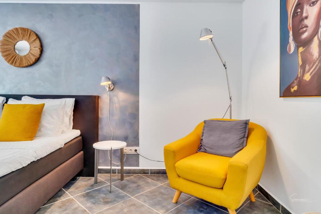 Postel nebo postele na pokoji v ubytování Casa la Naranja Boutique B&B