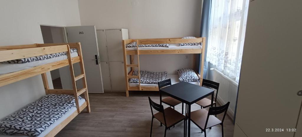 Postel nebo postele na pokoji v ubytování A Plus Hostel - Centrum