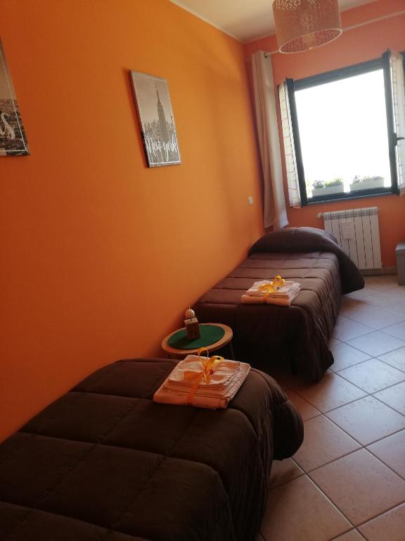 Postel nebo postele na pokoji v ubytování "Profumo di Tiglio"