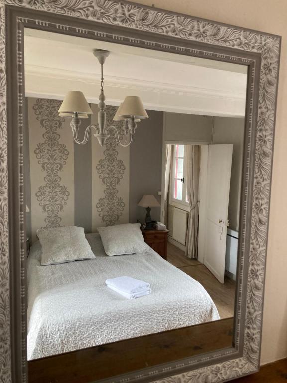 Postel nebo postele na pokoji v ubytování Les chambres d'hôtes Le Val d'Honfleur