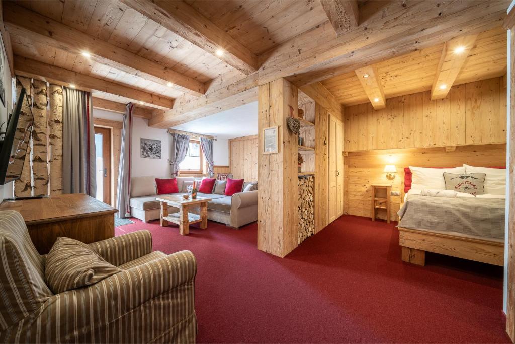 Postel nebo postele na pokoji v ubytování Tatrachalet Lomnica Rent