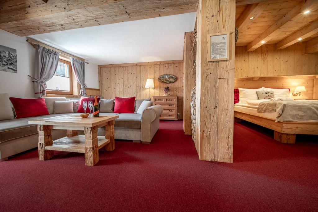 Postel nebo postele na pokoji v ubytování Tatrachalet Lomnica Rent