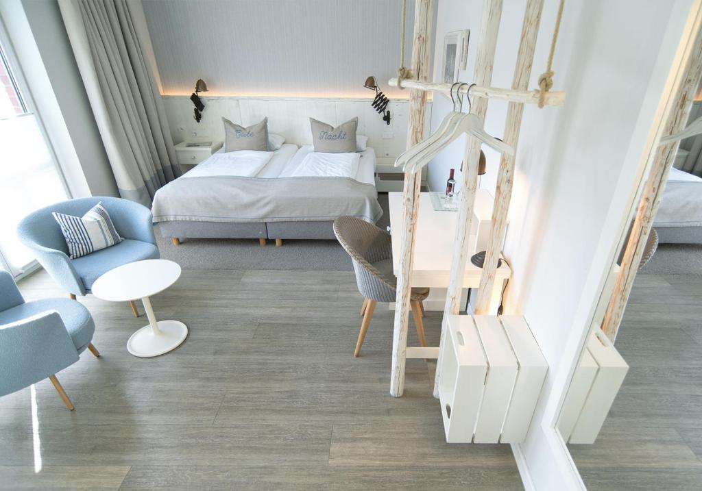 Postel nebo postele na pokoji v ubytování Hotel Am Medemufer