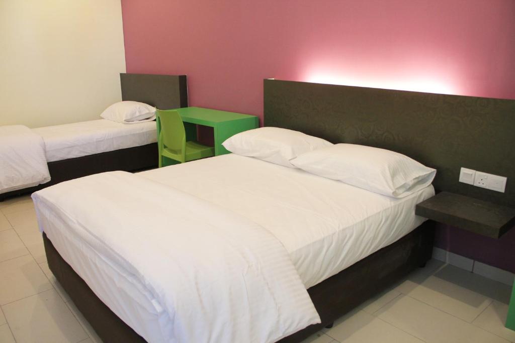 Postel nebo postele na pokoji v ubytování Hotel Mirage PD