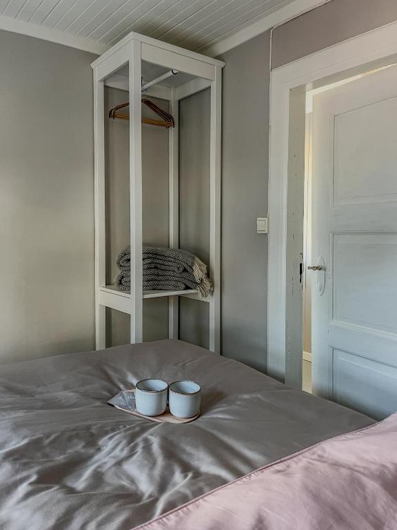 Кровать или кровати в номере Husly Reine - your home with Reinebringen view