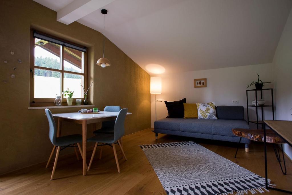 Posezení v ubytování Schneckenhaus Dachstein West