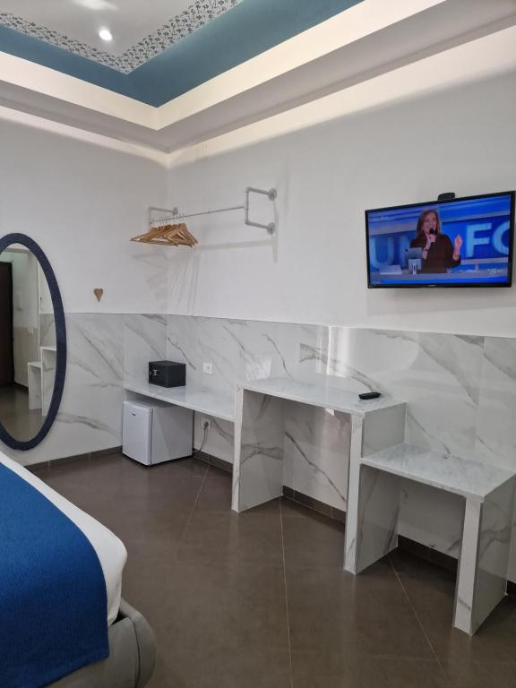 TV o dispositivi per l'intrattenimento presso ARI Guest house