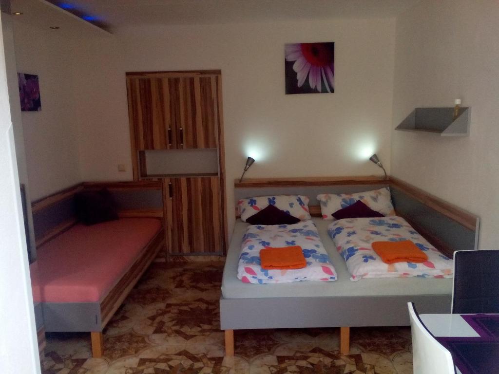 Postel nebo postele na pokoji v ubytování Apartmány Fialka