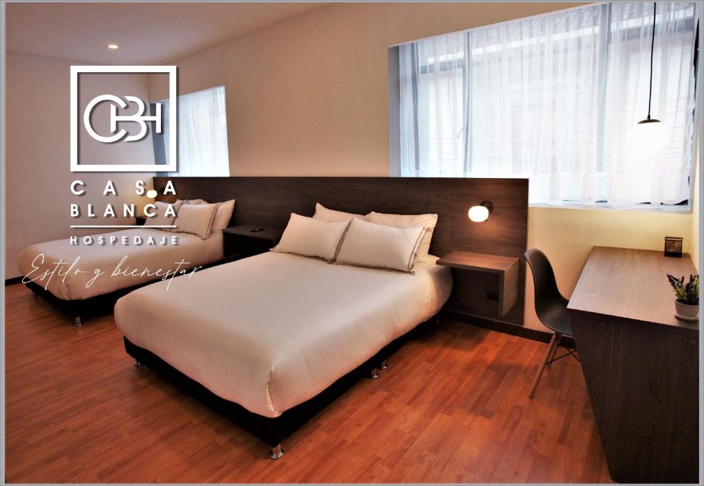 Кровать или кровати в номере Casa Blanca Hospedaje