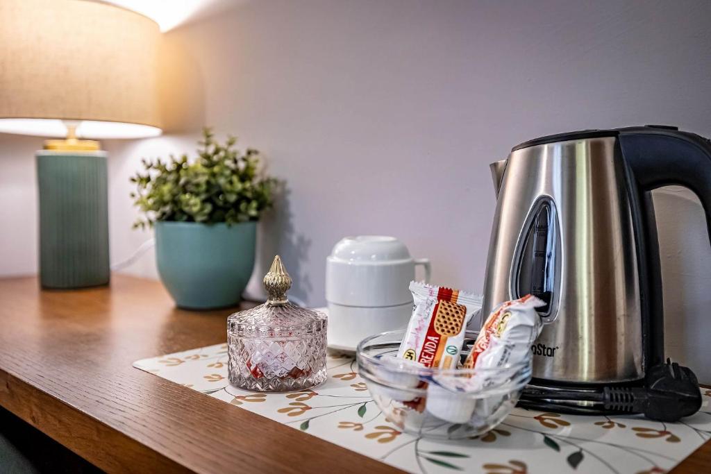 Príslušenstvo na prípravu kávy alebo čaju v ubytovaní Antico Centro Suite