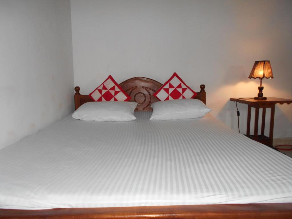 Postel nebo postele na pokoji v ubytování House Of Esanya