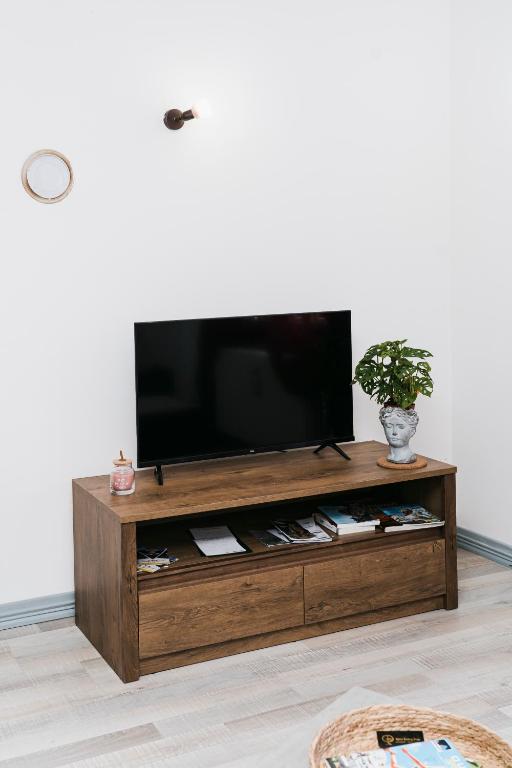 TV a/nebo společenská místnost v ubytování Al Borgo