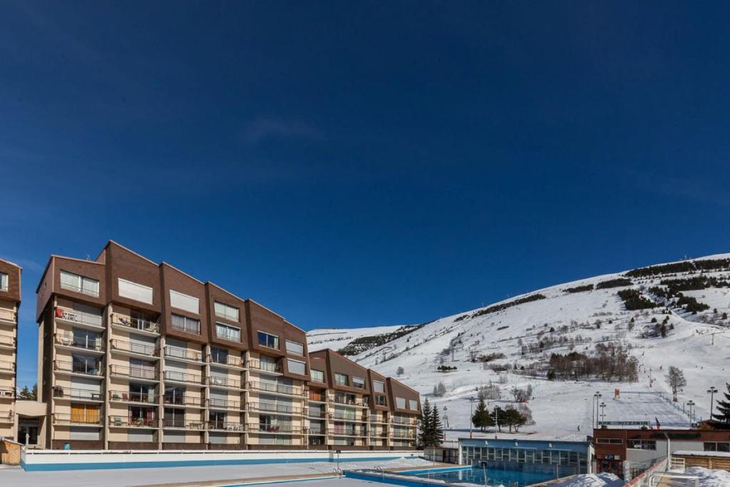 Nespecifikovaný výhled na hory nebo výhled na hory při pohledu z apartmánu