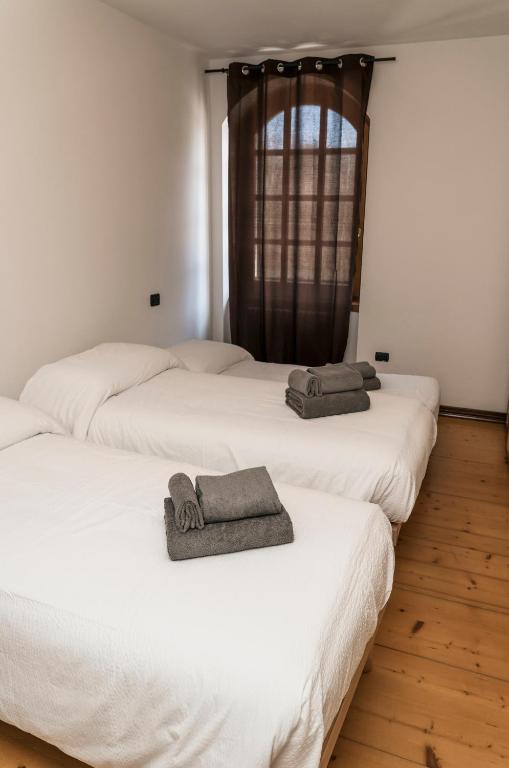 Postel nebo postele na pokoji v ubytování Al Borgo