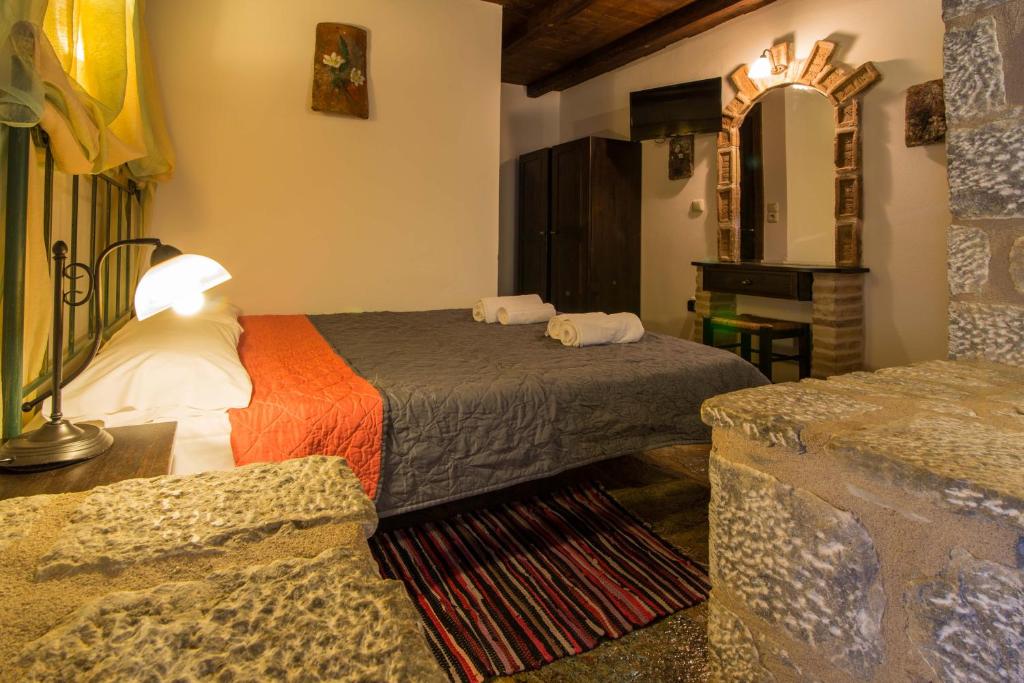 Postel nebo postele na pokoji v ubytování Psamathous Guesthouse