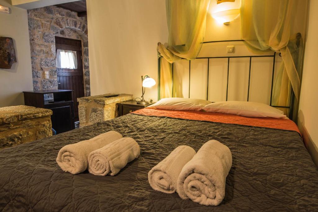 Postel nebo postele na pokoji v ubytování Psamathous Guesthouse