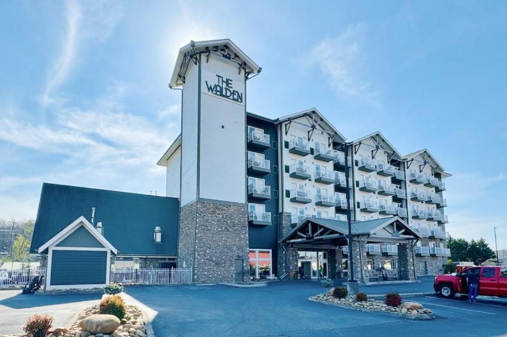 a hotel with a sign on the front of it at The Walden, Trademark Collection By Wyndham in Pigeon Forge