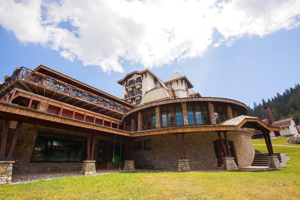 a large house on top of a hill at Termag Hotel Jahorina in Jahorina