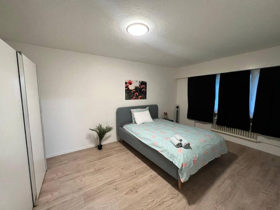 Postel nebo postele na pokoji v ubytování 2.5 Rooms Furnished Family Apartment in Luzern-44
