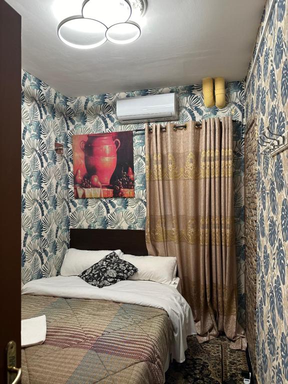 Posteľ alebo postele v izbe v ubytovaní Magenta Roma house