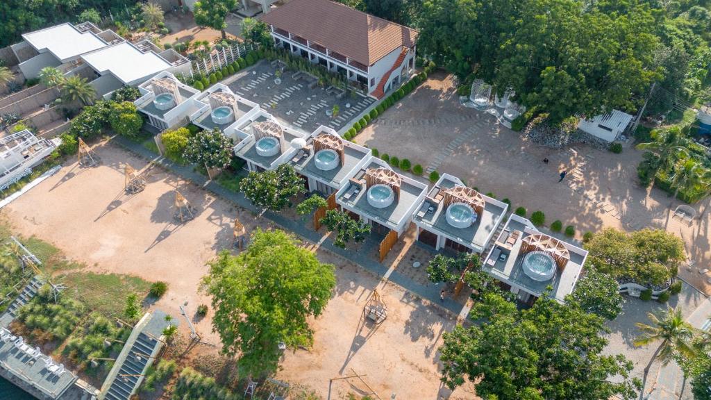 an overhead view of a building with a clock at Rimtalay Resort Koh Larn in Ko Larn