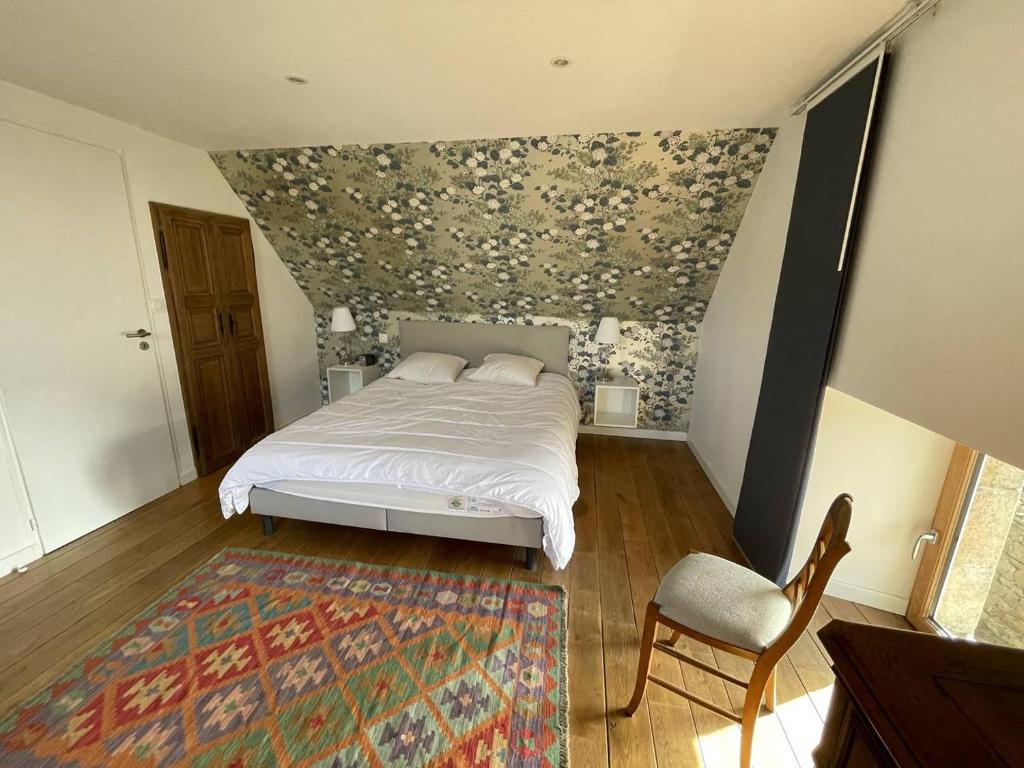 Katil atau katil-katil dalam bilik di Maison bretonne en pierre avec WIFI et piscine couverte &agrave; LOUANNEC - R&eacute;f 846