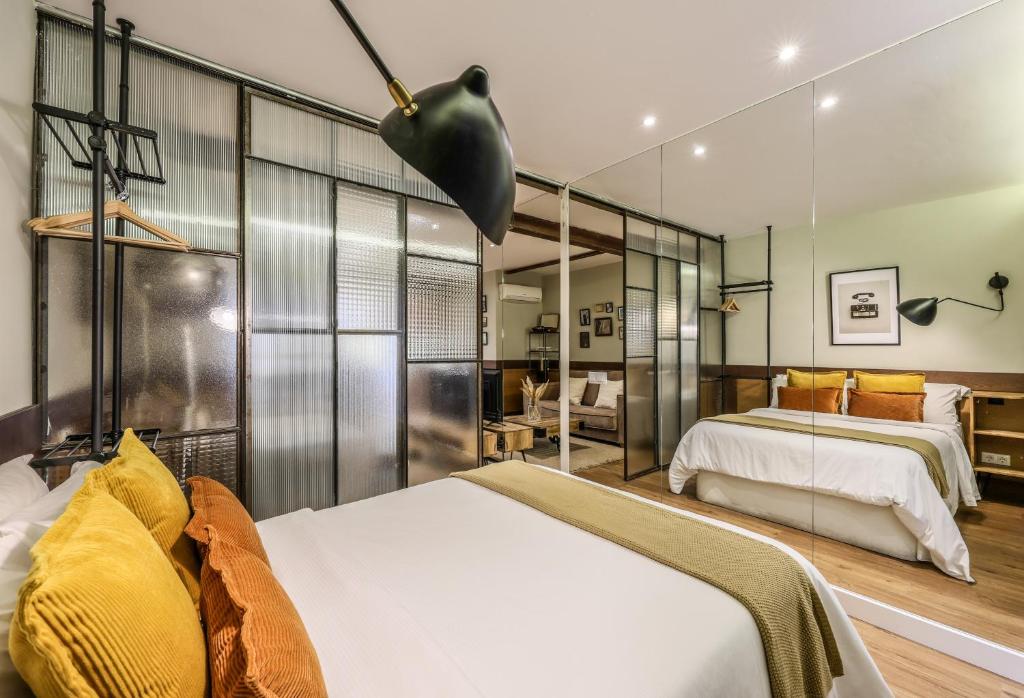 A bed or beds in a room at AP Chueca