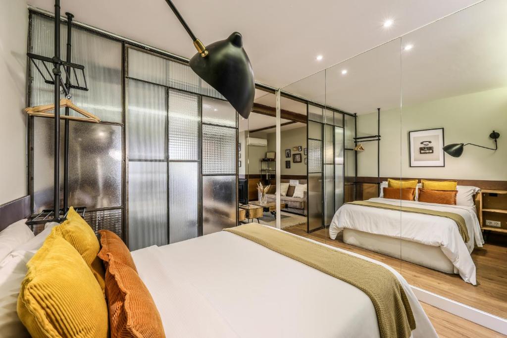 A bed or beds in a room at AP Chueca