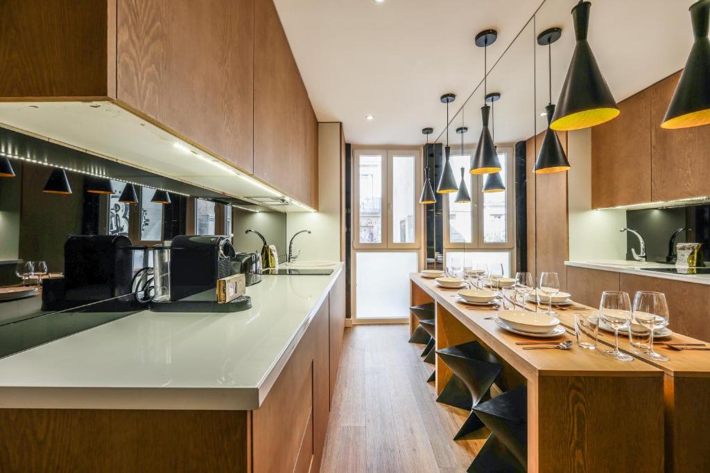 A kitchen or kitchenette at AP Chueca