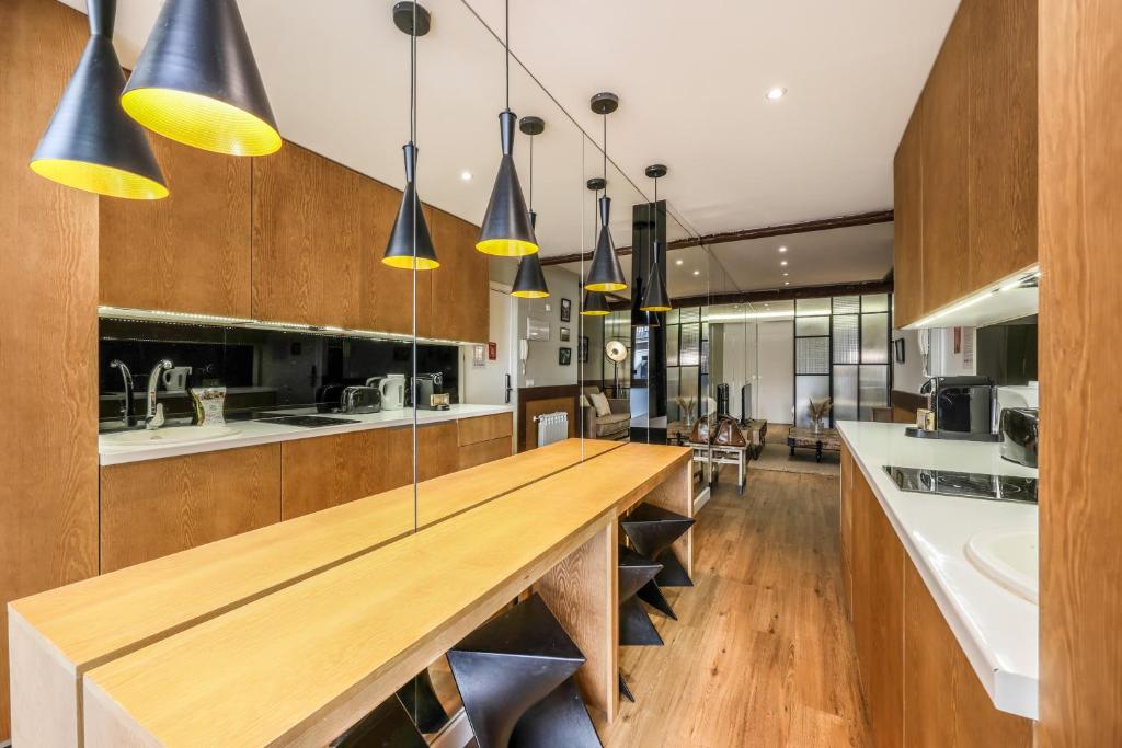 A kitchen or kitchenette at AP Chueca